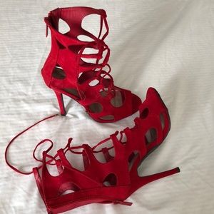 Straps red sexy heels size 7/12 never worn no tag